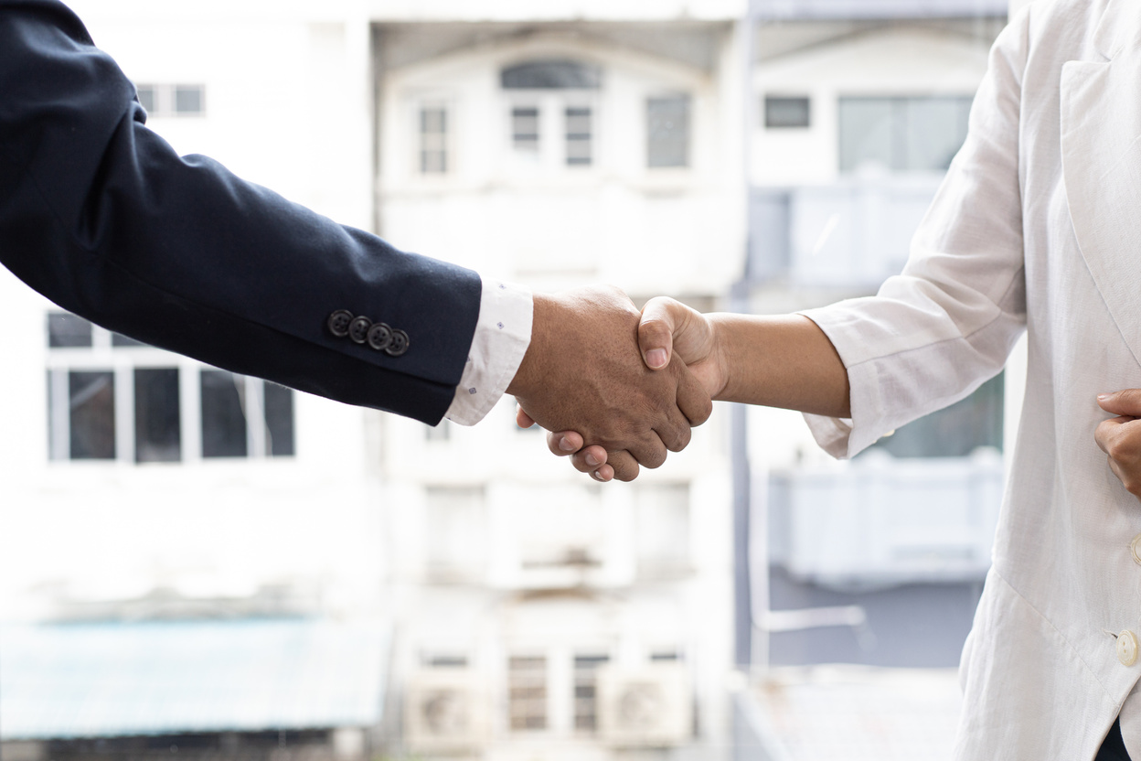 Colleagues Shaking Hands After Successful Deal